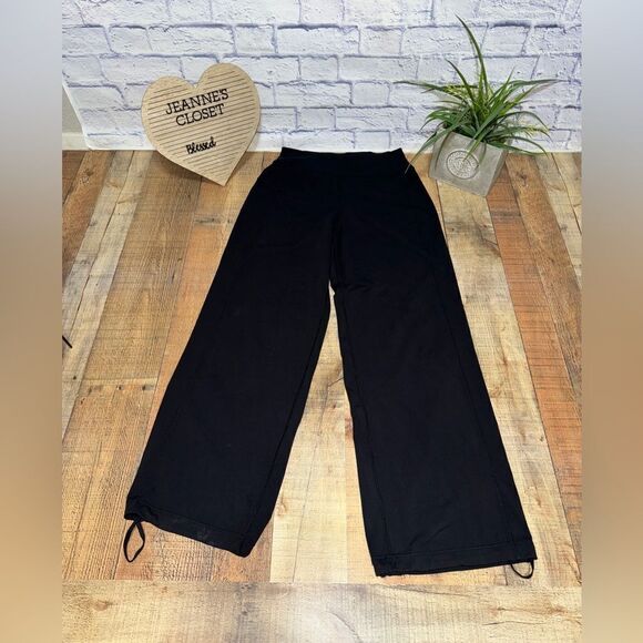 Lululemon Sit In Stillness Pant
Black wide leg drawstring bottom ankles size 10 - Picture 6 of 16